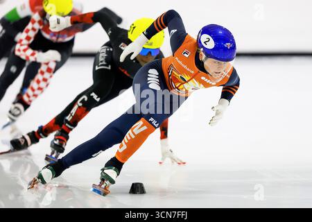 Skaters race during an ISU short track speed skating world tour event ...