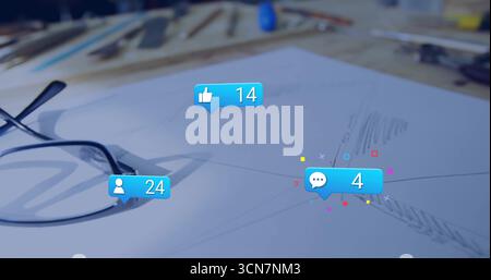 Showing sketch paper with pencil sketches on desk featuring glasses art supplies social media icons Stock Photo