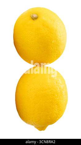 Ripe yellow lemon fruits with water droplets in stack are isolated on white background with clipping path. Stock Photo