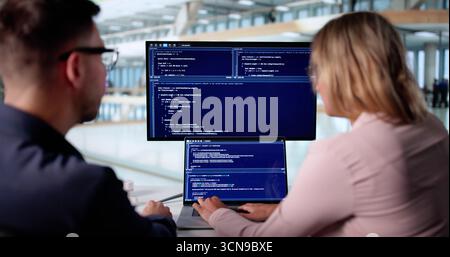 Programmer Leading Training Session Teaching Developer Coding Strategies In Office Stock Photo