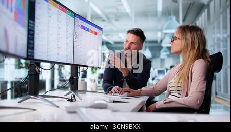 Corporate Leaders Training Employees On CRM Software For Customer Support. Stock Photo