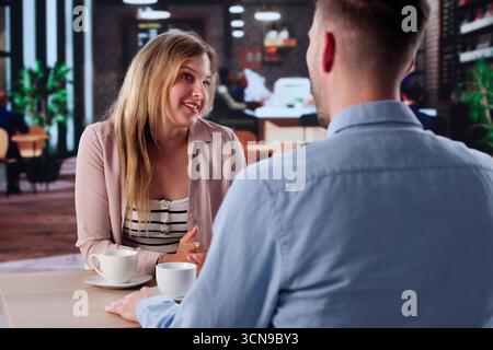 Moment Of Reflection: A Writer Sips His Coffee Passionately. Stock Photo