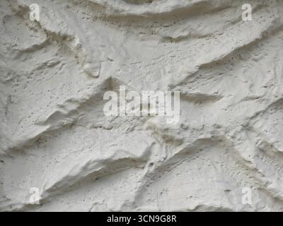 light grey plaster wall useful as a background Stock Photo