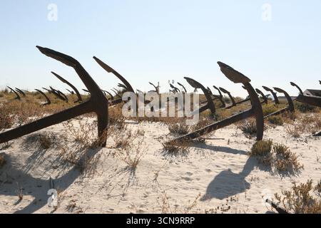 Tavira Praia do Barril beach, Tavira and the Cemitério das Âncoras (Cemetery of Anchors) Memorial to the tuna fleet Stock Photo