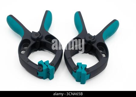 Two plastic clamps on a white background Stock Photo
