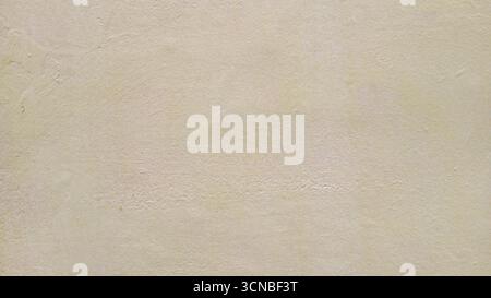 Soft wall background in warm beige tones Stock Photo
