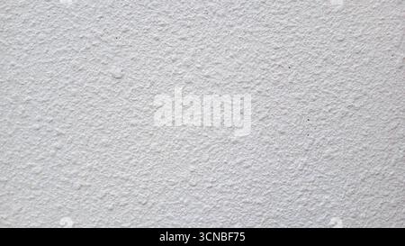 Textured white wall background with subtle grunge and copy space Stock Photo