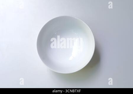 Empty white porcelain soup bowl image Stock Photo