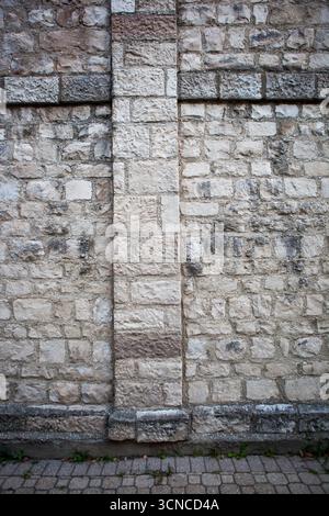Grey brick wall embossed texture background Stock Photo