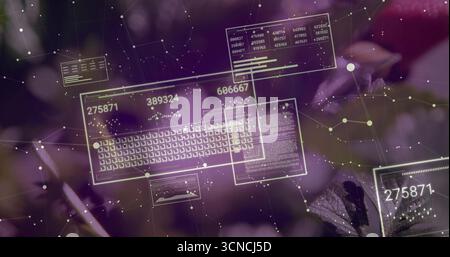 Displaying AR interface over purple floral backdrop with keyboard, numeric panels and network nodes Stock Photo