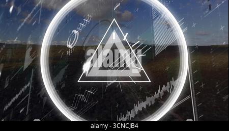 Displaying translucent HUD overlay over grassy plain, with glowing ring and triangular symbol Stock Photo