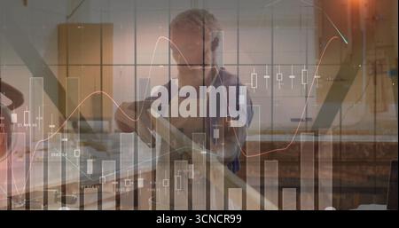 Carpenter wearing beige apron smoothing plank using hand plane in workshop, with financial charts Stock Photo