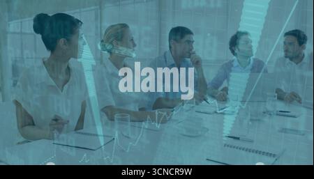 Discussing team analyzing market data in office, with notebooks, pens and financial charts Stock Photo