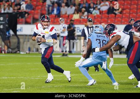 Toronto, Canada. 19th Sep, 2025. quarterbacK McLeod Bethel-Thompson #4 of Montreal Alouettes scrambles out of pocket in the first half during the week 16 CFL football game 2025 at BMO Field. on September 19, 2025 in Toronto, Canada. (Photo by Leonardo Ramirez/Eyepix Group) Credit: Eyepix Group/Alamy Live News Stock Photo