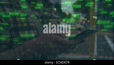 Scrolling smartphone man wearing yellow plaid shirt on bus, with green binary code overlay Stock Photo