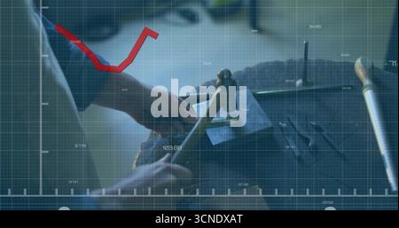 Hammering chisel over tile at workshop bench in grey shirt, surrounded by tools and grid overlay Stock Photo