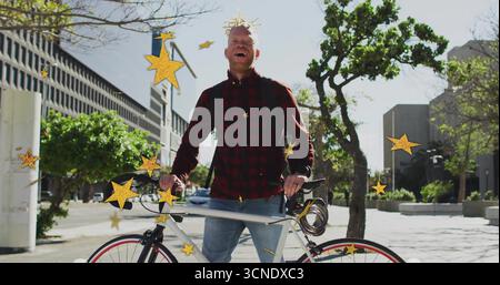 Commuter holding white road bicycle and standing on sunlit plaza, with backpack and cable lock Stock Photo