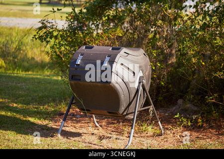 Black compost tumbler, for making home made composted fertilizer! Stock Photo