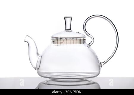 Glass transparent teapot isolated on white background Stock Photo