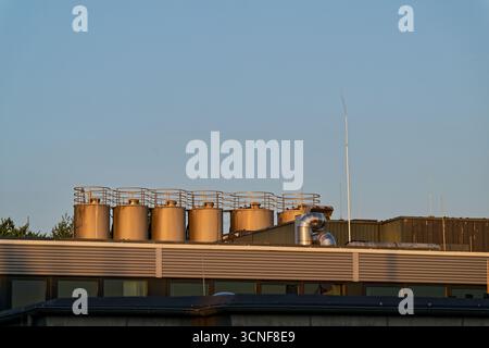 Steel Containers Rise Large metal containers and pipes Stock Photo - Alamy