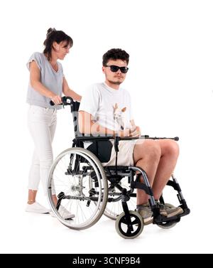 black wheelchair in front of white background Stock Photo
