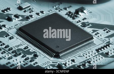 Semiconductor on a circuit board. Macro shot of a chip integrated in a modern electronic device Stock Photo