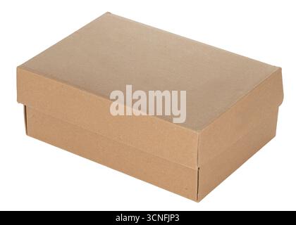 Macro close up of corrugated brown cardboard surface showing vertical ridges and recycled paper texture Stock Photo