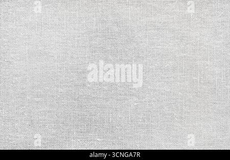 White background of natural cloth texture, linen fabric, ideal for both design projects and artistic use Stock Photo