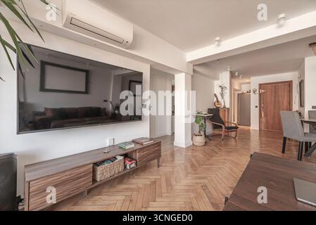 Side or end tables are useful next to armchairs or on the sides of the sofa, providing additional space for lamps, remote controls Stock Photo