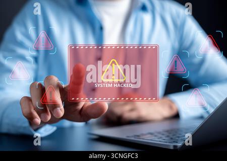 Cyber warning hacked alert on laptop screen with digital system breach, cyberattack, data security Stock Photo