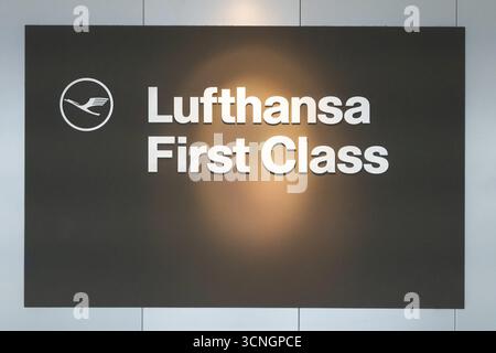 Illuminated sign in the airport for a lounge with the inscription Lufthansa First Class, Frankfurt, Germany Stock Photo