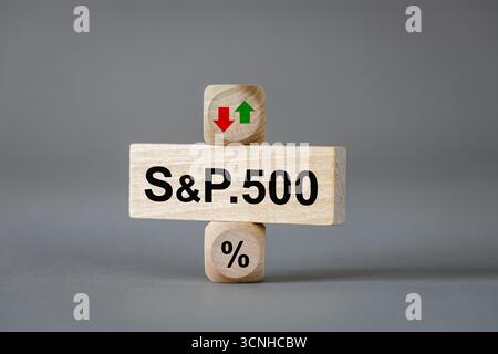 S&P 500 index symbol. Wooden blocks with an arrow that symbolizes a change in the S&P 500 index trend, either an increase or decrease. Business concep Stock Photo