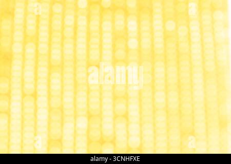 Abstract yellow bokeh background. Soft light defocused spots Stock Photo
