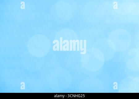 Abstract background blue bokeh circles for Christmas and New Year background Stock Photo