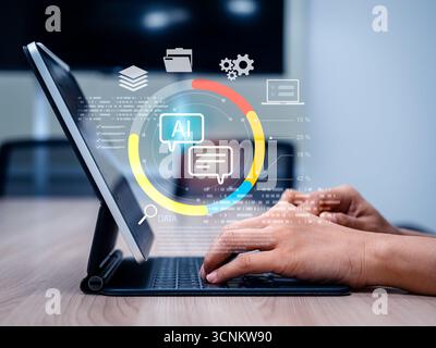 Businessman hands typing on tablet keyboard with virtual AI agent interface and data analytics graphics representing AI automation, smart assistant te Stock Photo