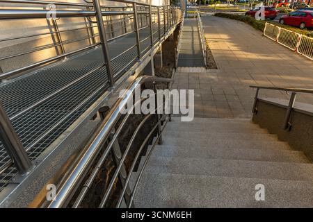 Accessible ramp for disabled people, metal ramp with handrails for ...
