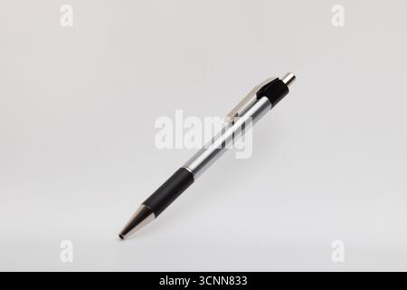 Black-barreled pen with silver tip Stock Photo
