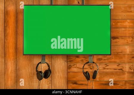 New modern digital presentation screen with chromakey copy space and headphones Stock Photo