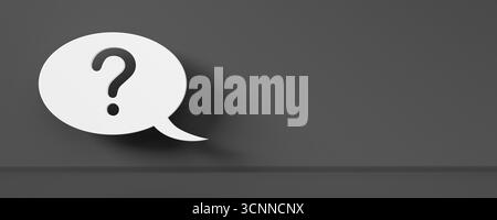 Single white speech bubble with question mark on dark grey room background with copy space, idea, solution or question or communication business conce Stock Photo