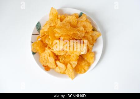 Potato chips on a plate Stock Photo