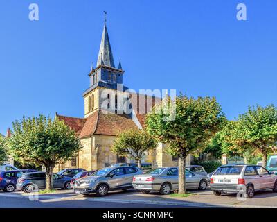 11th to 16th century Saint-Gervais-Saint-Protais church with car parking - Le Grand-Pressigny, Indre-et-Loire (37), France. Stock Photo