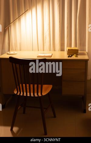 Cozy Home Office Desk with Warm Lighting - West Lake in Huizhou, Guangdong Province, China, is a tourist attraction featuring ancient architecture Stock Photo