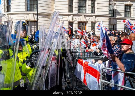 Marchers Confront Metropolitan Police Officers Standing Behind Riot ...