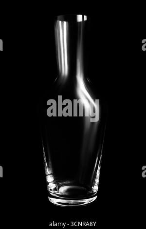Empty clean glass vase isolated on black background Stock Photo