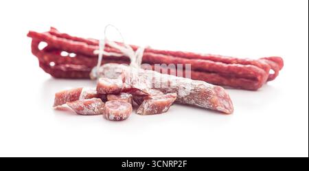 Sliced fuet sausage with mold isolated on a white background. Stock Photo