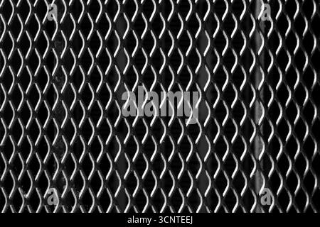 Black and white steel metal mesh texture useful for background Stock Photo