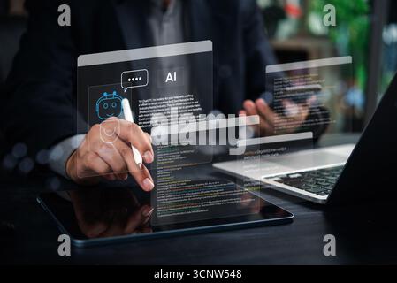 Businessman with AI chatbot interface and coding screen. Concept of artificial intelligence, virtual assistant, and digital transformation customer se Stock Photo