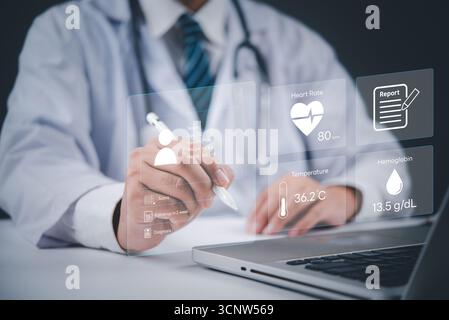 Doctor using digital health records with holographic interface, tracking patient heart rate, temperature, and hemoglobin levels for advanced medical c Stock Photo
