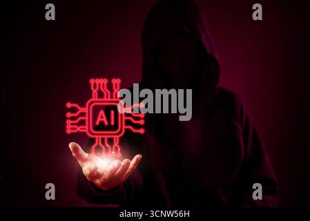 AI hacker holding a glowing red chip symbolizing artificial intelligence in cybercrime, darkweb, and digital technology threat for cybersecurity and m Stock Photo