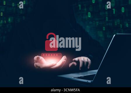 Cybersecurity threat concept. Hacker hand reveals glowing unlocked padlock and password, Digital crime warning data breach, cyber attack, and digital Stock Photo